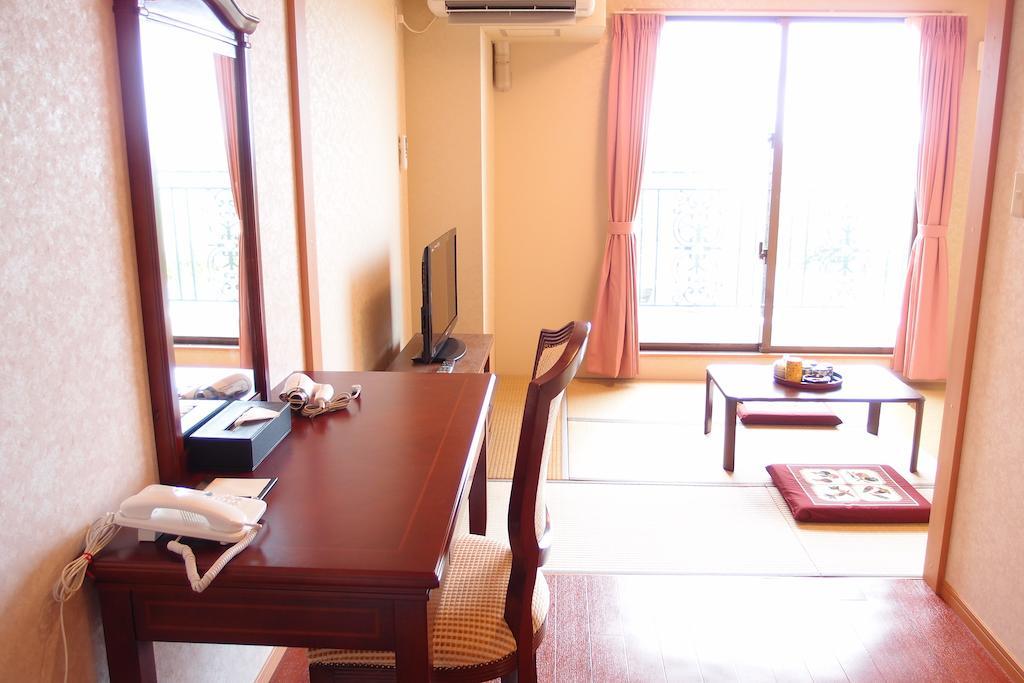 Hotel Castlevillage Miyakojima Номер фото